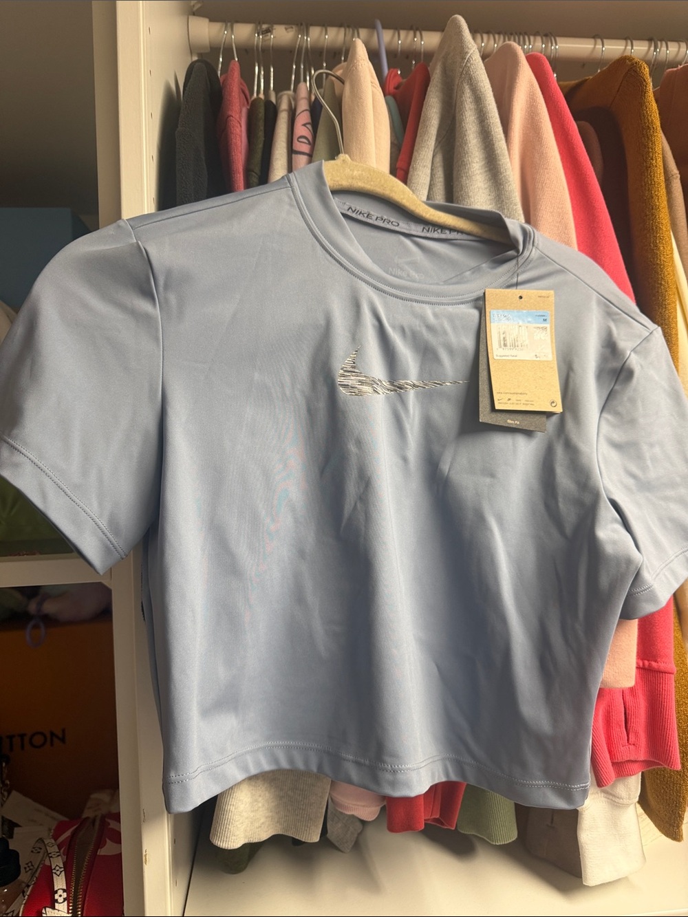 Nike Sky Blue Cropped Dri-FIT Tee with Silver Swoosh